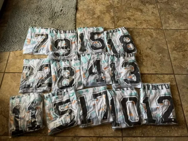 Buyer’s photo: American football jerseys, plus replacement baseball jerseys for a size adjustment (United States)